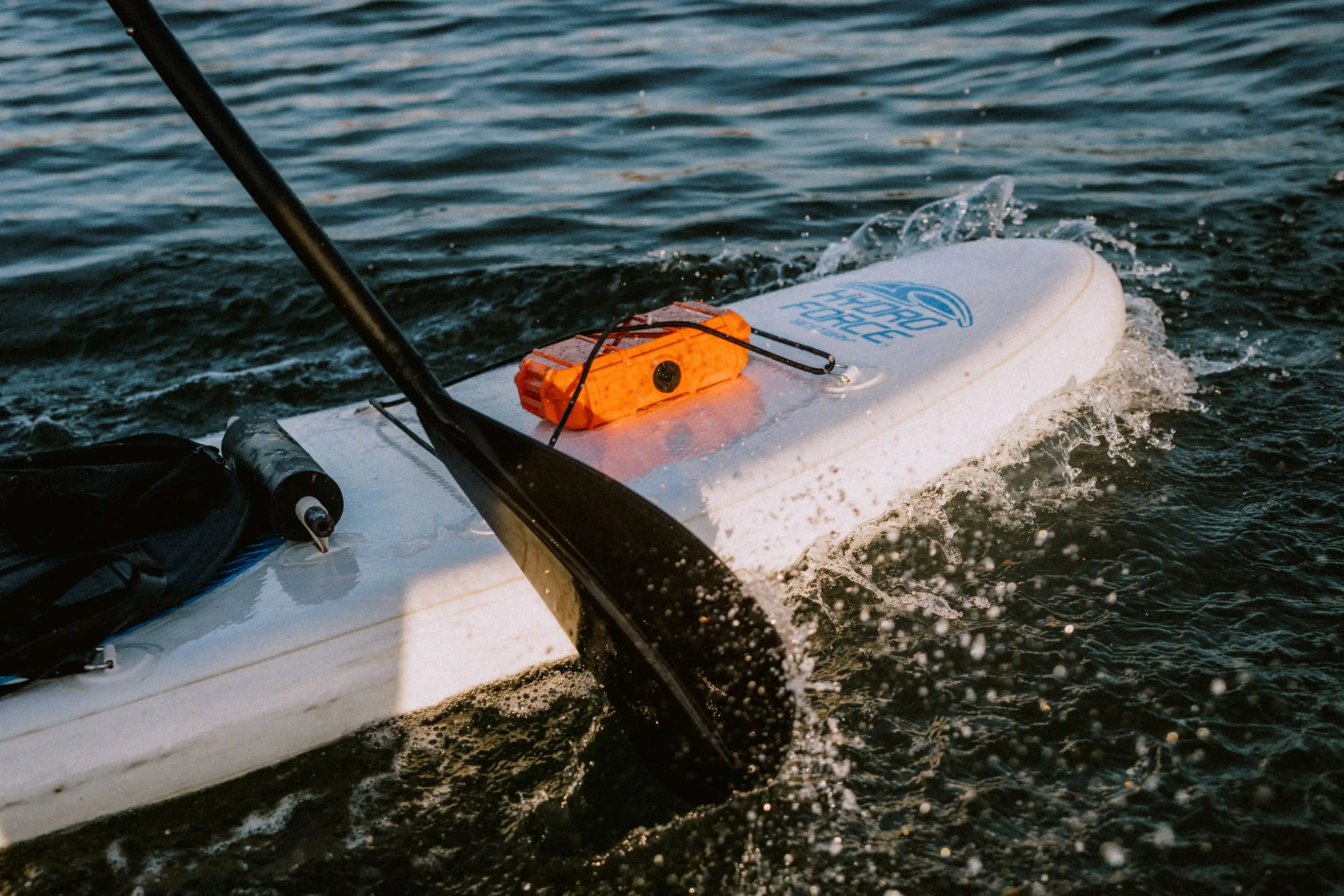 Evergreen TOUGHBOX SE56 On a paddle board